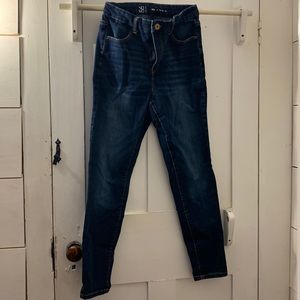 Non-ripped, blue jeans.